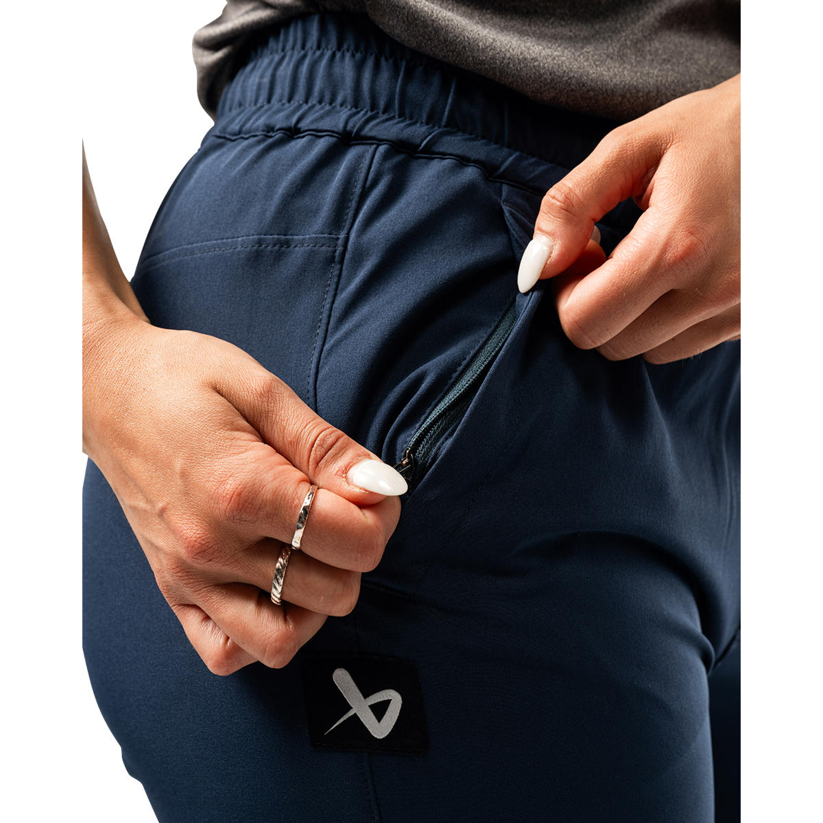 Kalhoty BAUER S25 WMNS TEAM WOVEN JOGGER-NVY (1064630)